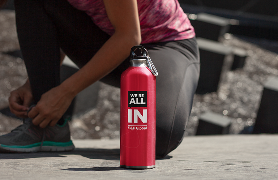 aluminum-water-bottle-mockup-featuring-a-woman-tiding-up-her-shoes-14883a 1